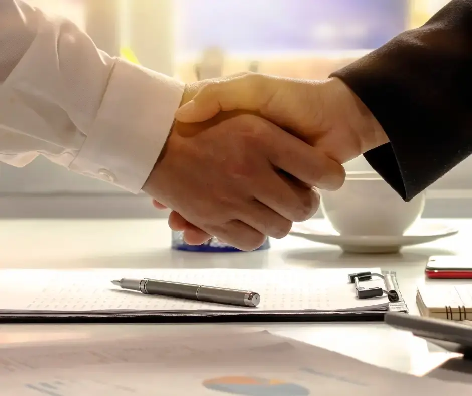 Two people shaking hands